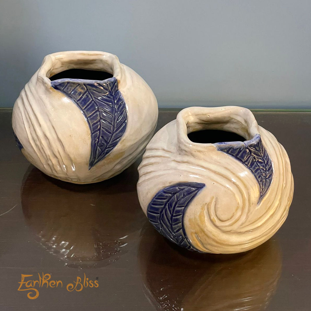 Elegant white pots with intricate blue design