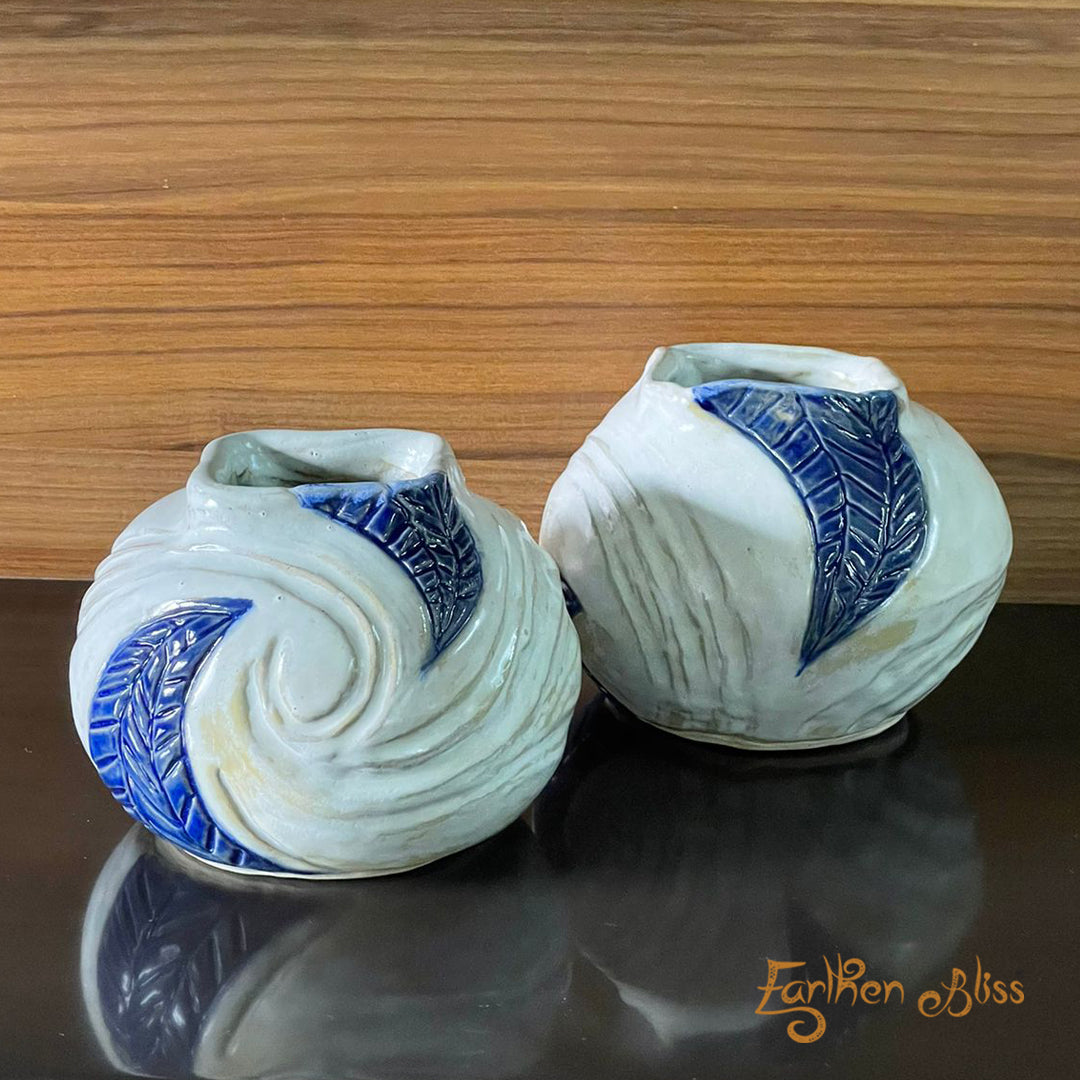 Elegant white pots with intricate blue design