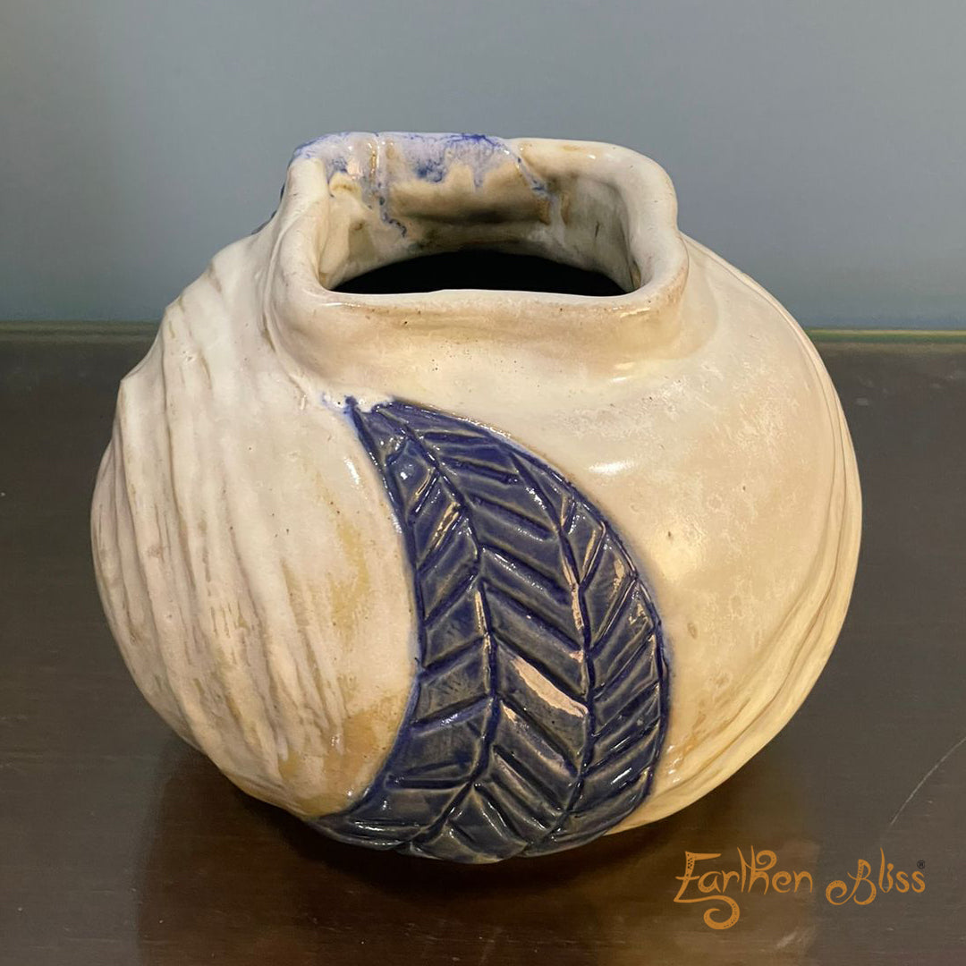 Elegant white pot with intricate blue design