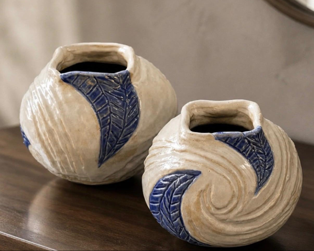 Elegant white pots with intricate blue design